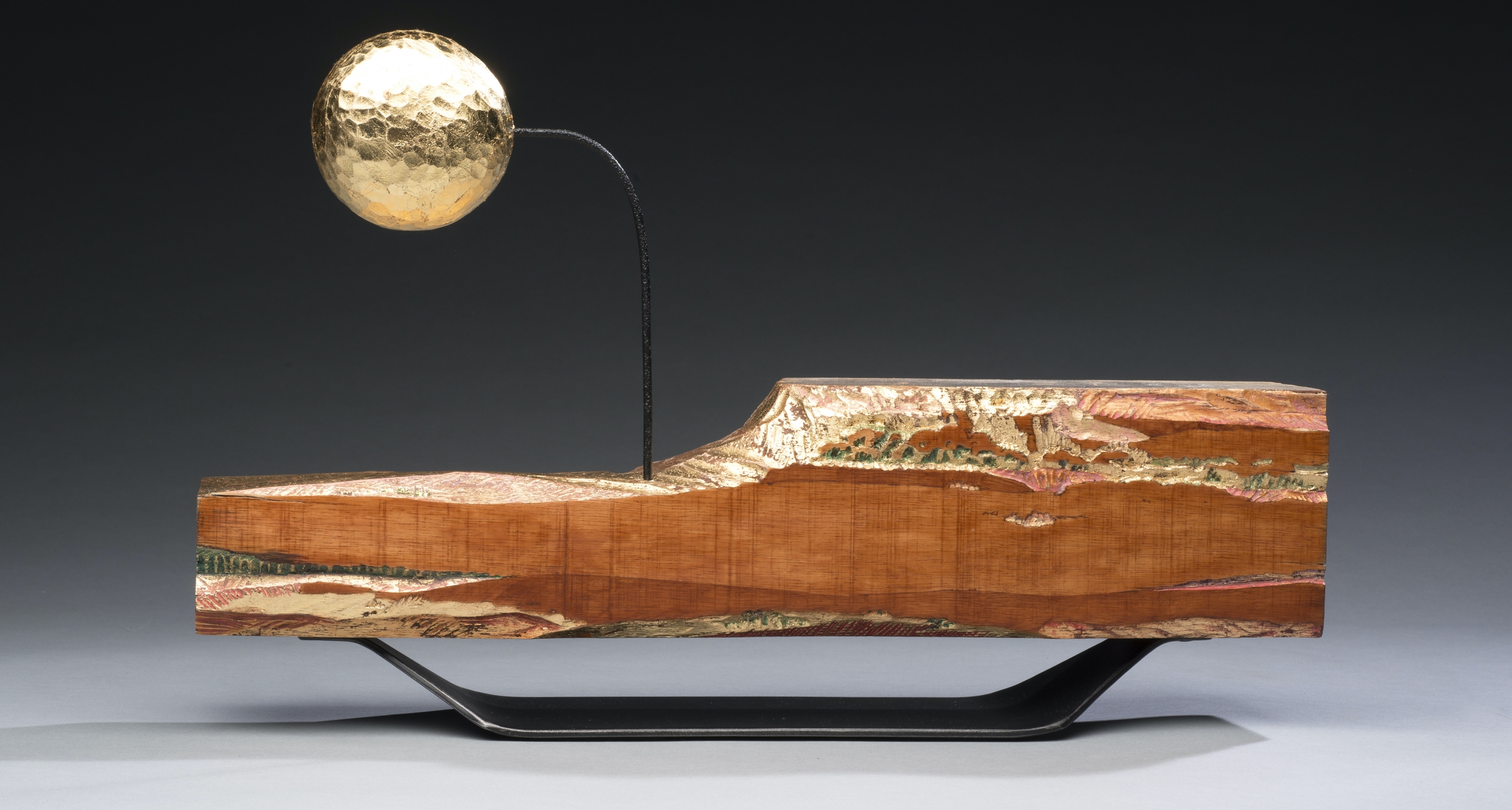 14. Sergio Tapia (b.1972) "Sunset, Moonrise," carved and gilt bass wood with metal, 10 1/2 x 16 3/4 x 4 inches